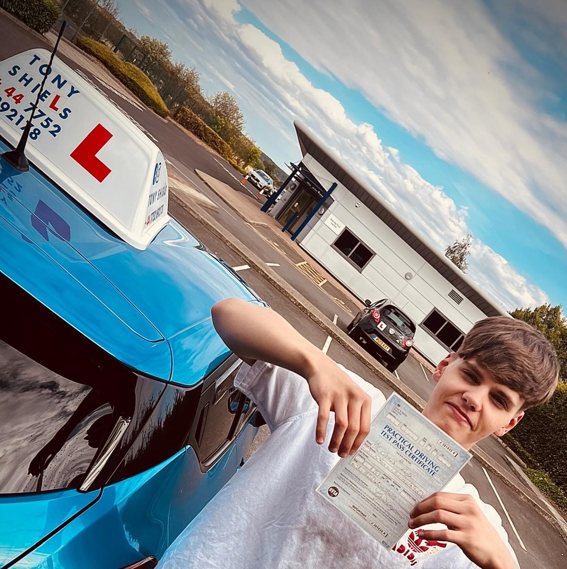 Learner celebrating passing their driving test
